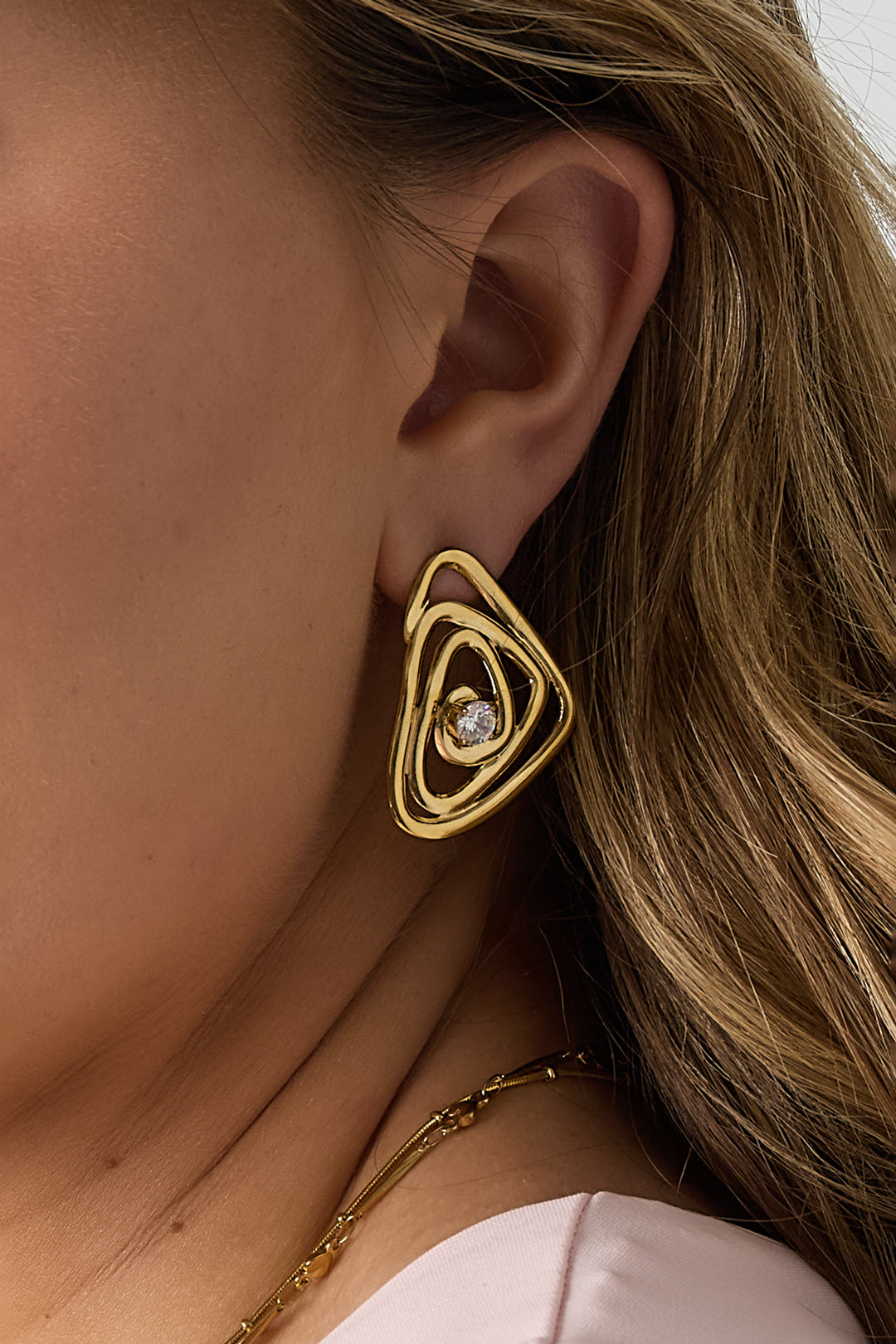 Hypnosis earrings with stone