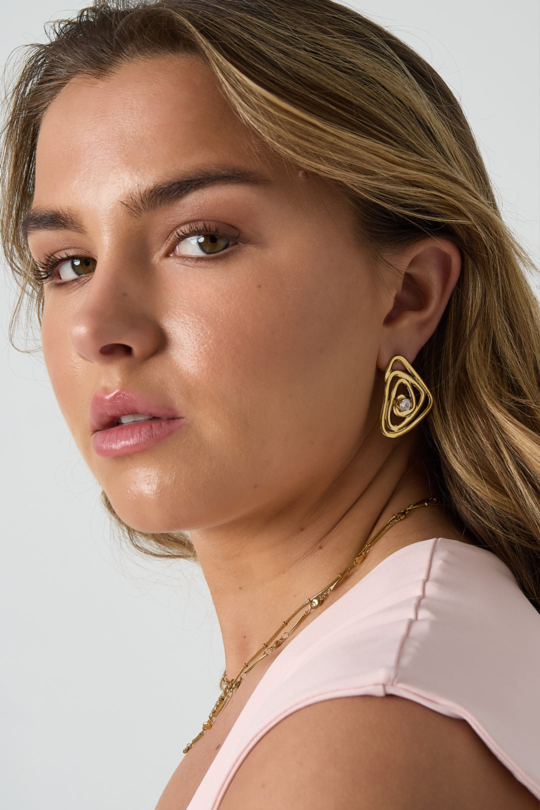 Hypnosis earrings with stone